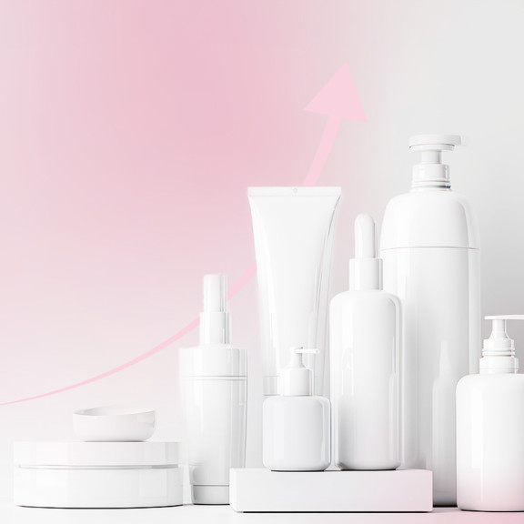 Collection of generic cosmetics bottles against a gradient pink-white background